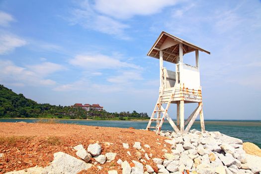 beach life guard tower on dry meadow at Rayong beach in Thailand