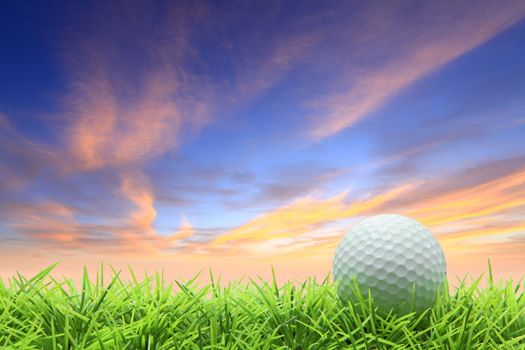 isolated golf ball on green grass over beautiful sky