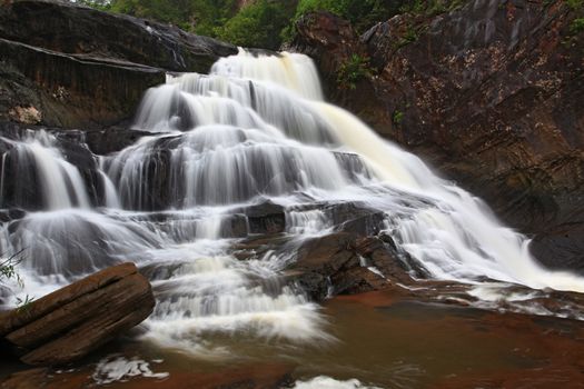 tropical rainforest waterfall in jungle of Thailand
