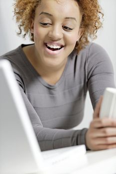 Beautiful young business woman taking a break at her desk