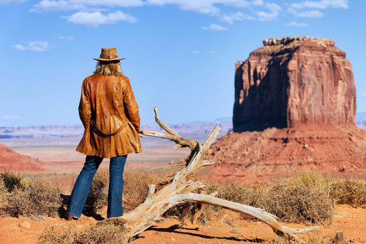 lonely cowgirl at Monument Valley, Utah, USA