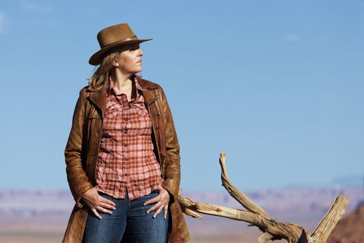 fashion cowgirl in the desert, Utah, USA