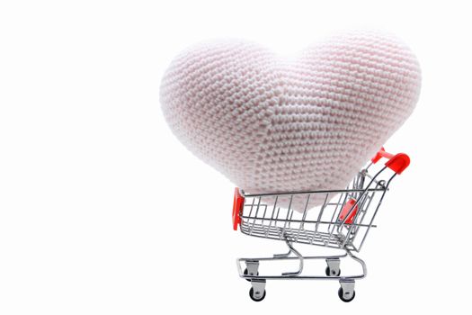 heart delivery in Shopping cart isolated on white