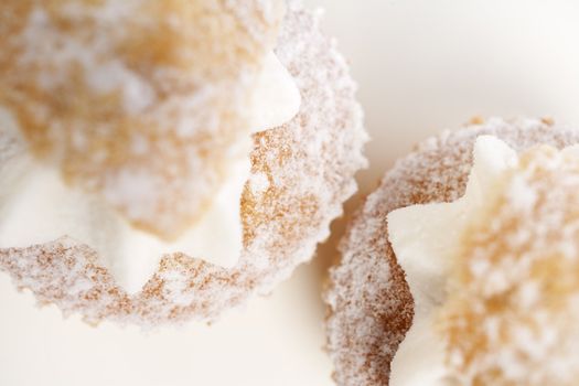 Freshly baked cup cakes with cream filling