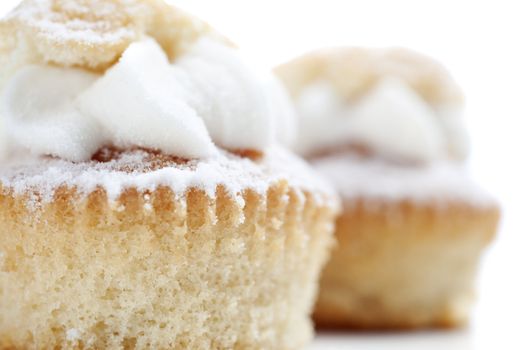 Freshly baked cup cakes with cream filling