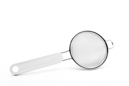 Kitchen sieve utensil equipment isolated on white