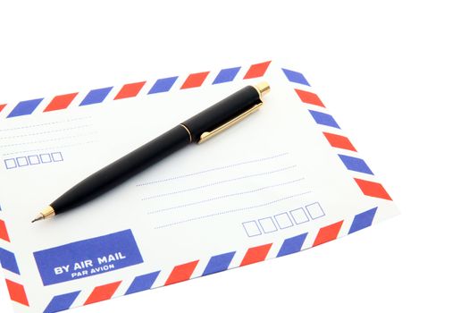 air mail envelope with pen isolated on white background