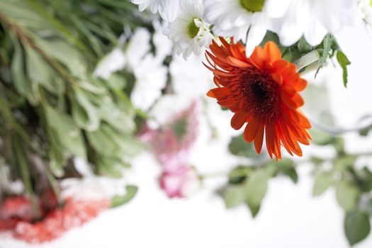 Flower cuttings being prepared to be arranged to make a bouquet.