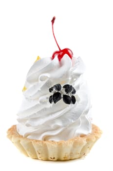 cupcake and bijouterie flower on a white background