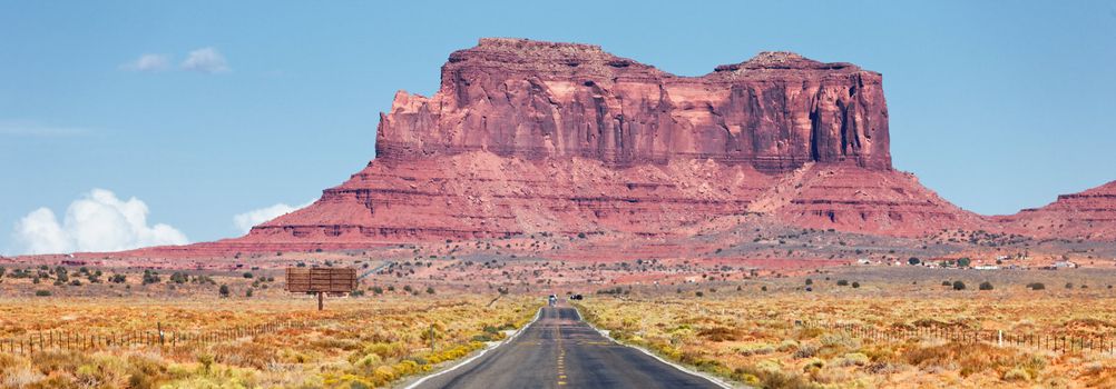 panoramic view of long road to Monument Valley, USA
