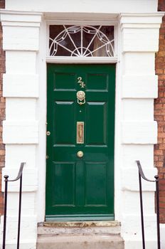 Grand green door in London, England