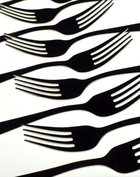 Silhouette of forks isolated on white background