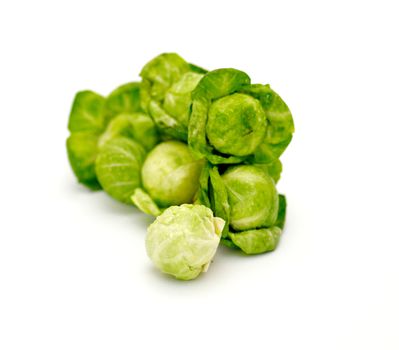 Arrangement of brussels sprouts isolated on white background