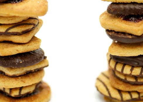 Shortcakes with chocolate glaze isolated on white background