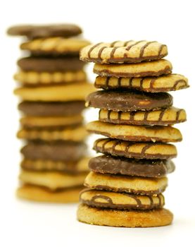 Shortcakes with chocolate glaze isolated on white background