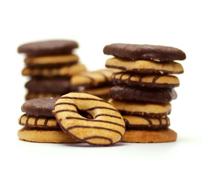 Shortcakes with chocolate glaze isolated on white background