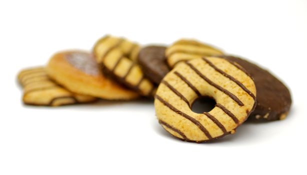 Shortcakes with chocolate glaze isolated on white background