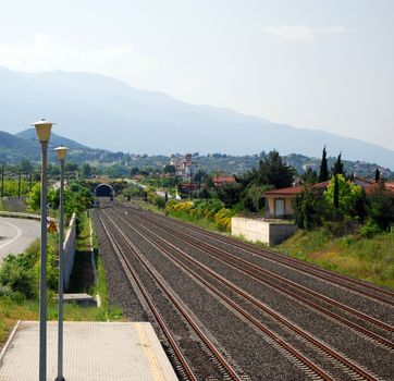 railroad with tunnel and crossroads