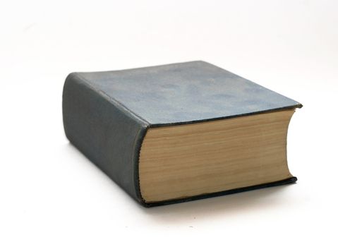 Old solid book with the dust on the cover