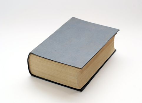 Old solid book with the dust on the cover