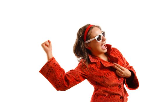 Modern looking young woman wearing a red jacket and sunglasses