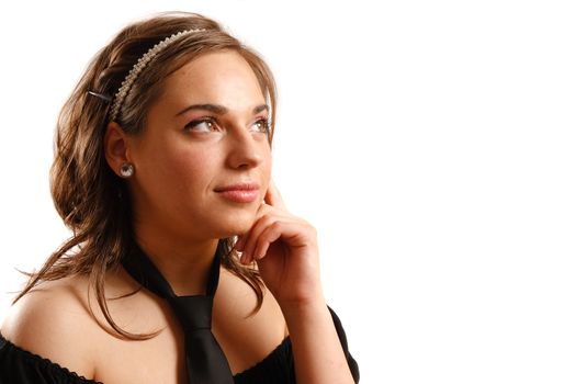 Modern looking young woman wearing a black dress and tie