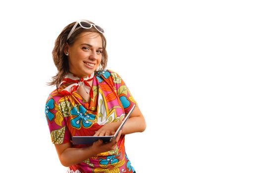 Modern looking young woman holding a notebook