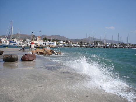 Waves in Aegina port in Greece                             