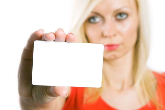Portrait of a beautiful business woman holding a blank white notecard (business card)