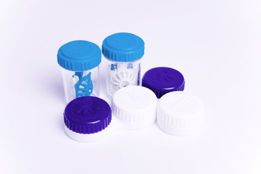 Set of contact lens cases.