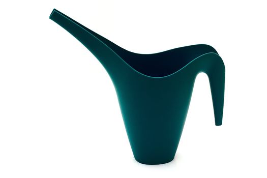 The modern plastic watering can is isolated on a white background