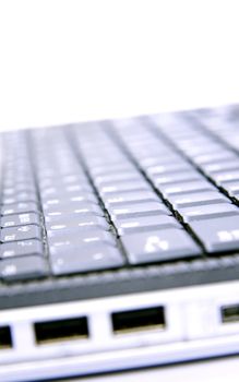 Notebook keyboard. Image with soft blue tint.