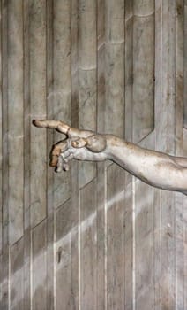 the hand of God, part of a statue of the Renaissance