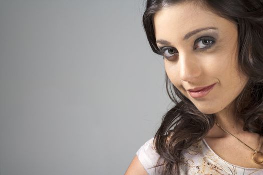 Portrait of young woman on isolated background