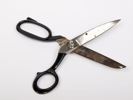 old black rusty scissors isolated