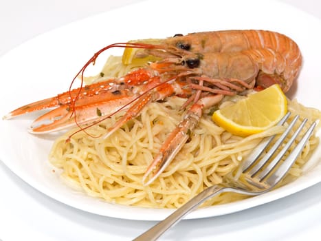 pasta with shrimps on the plate