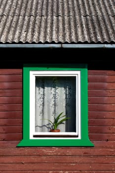 old wooden window in wood wall