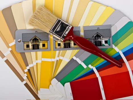 paint brush and houses in diferent colors