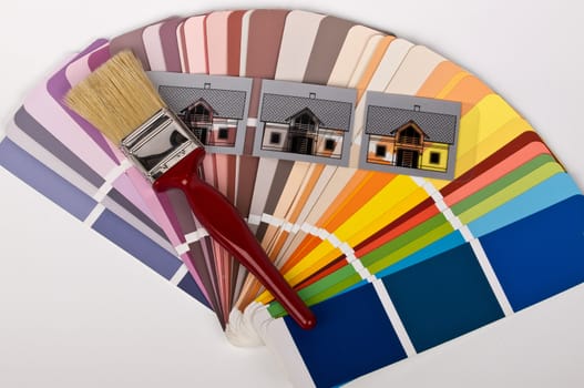 paint brush and houses in different colors