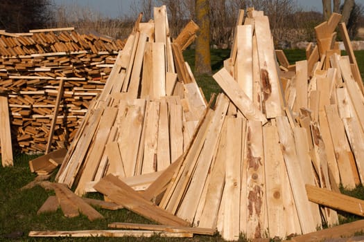 Pile of freshly cut and split firewiood.