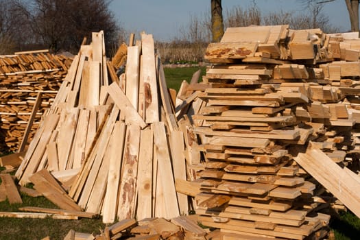 Pile of freshly cut and split firewiood.