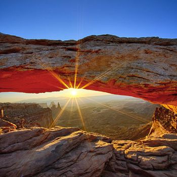 Sunrise at Mesa Arch in Canyonlands National Park, Utah, USA 