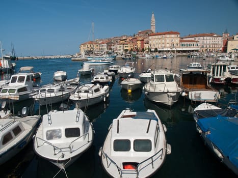 city of Rovinj in Istria and boats in the harbour