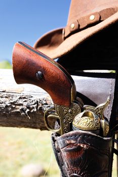 gun and hat outdoor under sunlight in autumn