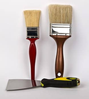 paint brush and spatula for painting jobs