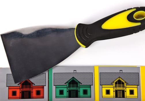 spatula and houses in different colors