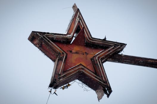 Old, dilapidated and destroyed soviet union star sign