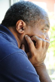 African American male expressions indoors.