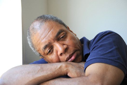 African American male expressions indoors.