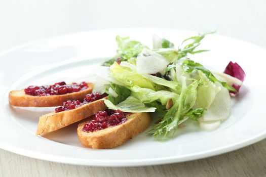 Fresh and tasty salad in white dish
